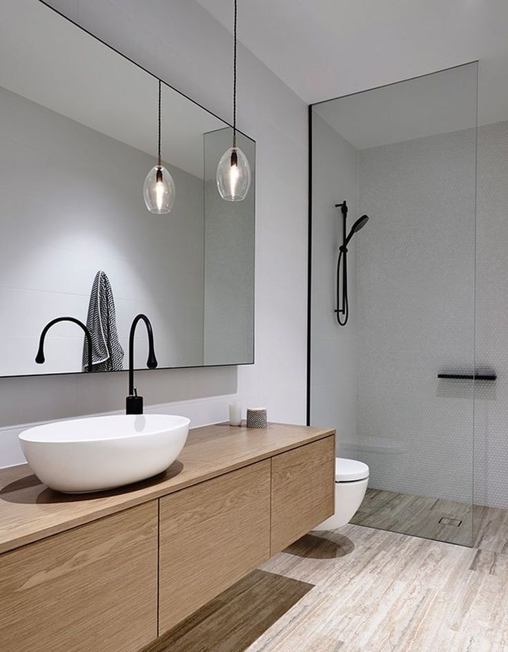 Утонченный и изысканный минималистический дизайн ванной в светлых тонах